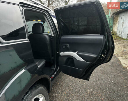 Чорний Міцубісі Аутлендер ХЛ, об'ємом двигуна 2.4 л та пробігом 283 тис. км за 8900 $, фото 12 на Automoto.ua