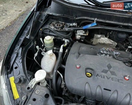 Чорний Міцубісі Аутлендер ХЛ, об'ємом двигуна 2.4 л та пробігом 283 тис. км за 8900 $, фото 30 на Automoto.ua