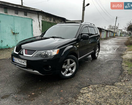 Черный Мицубиси Аутлендер ХЛ, объемом двигателя 2.4 л и пробегом 283 тыс. км за 8900 $, фото 3 на Automoto.ua