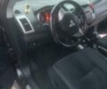 Черный Мицубиси Аутлендер ХЛ, объемом двигателя 2.36 л и пробегом 270 тыс. км за 9200 $, фото 14 на Automoto.ua