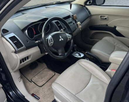 Чорний Міцубісі Аутлендер ХЛ, об'ємом двигуна 3 л та пробігом 243 тис. км за 12500 $, фото 27 на Automoto.ua