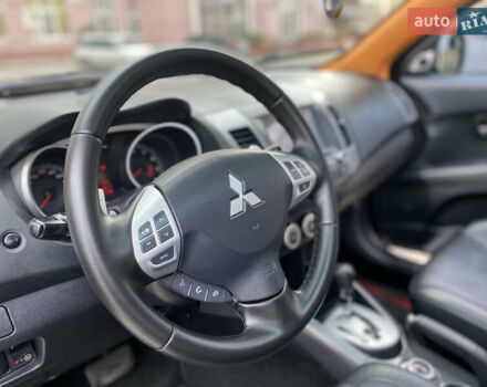 Черный Мицубиси Аутлендер ХЛ, объемом двигателя 3 л и пробегом 154 тыс. км за 8900 $, фото 36 на Automoto.ua