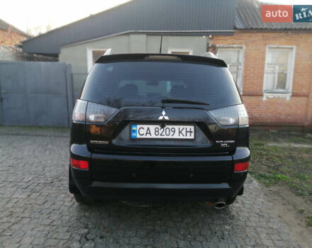 Чорний Міцубісі Аутлендер ХЛ, об'ємом двигуна 2.38 л та пробігом 228 тис. км за 7850 $, фото 4 на Automoto.ua