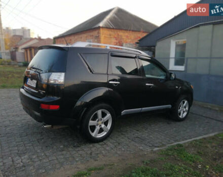 Чорний Міцубісі Аутлендер ХЛ, об'ємом двигуна 2.38 л та пробігом 228 тис. км за 7850 $, фото 3 на Automoto.ua