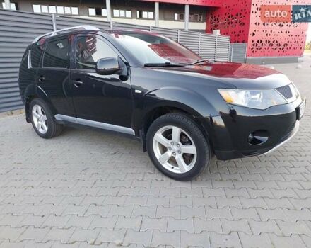Чорний Міцубісі Аутлендер ХЛ, об'ємом двигуна 2.4 л та пробігом 181 тис. км за 8990 $, фото 6 на Automoto.ua