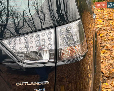 Черный Мицубиси Аутлендер ХЛ, объемом двигателя 3 л и пробегом 285 тыс. км за 9590 $, фото 10 на Automoto.ua