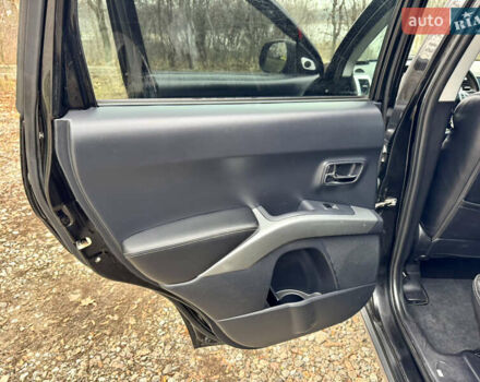 Чорний Міцубісі Аутлендер ХЛ, об'ємом двигуна 2.4 л та пробігом 229 тис. км за 9790 $, фото 15 на Automoto.ua