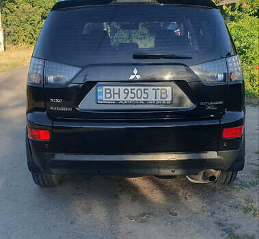 Чорний Міцубісі Аутлендер ХЛ, об'ємом двигуна 2.4 л та пробігом 325 тис. км за 7000 $, фото 3 на Automoto.ua