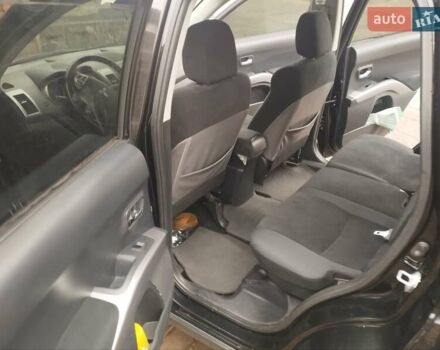 Черный Мицубиси Аутлендер ХЛ, объемом двигателя 2.36 л и пробегом 41 тыс. км за 12000 $, фото 5 на Automoto.ua