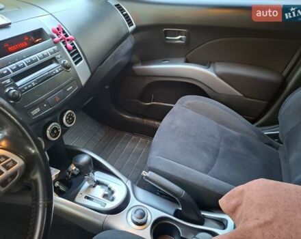 Черный Мицубиси Аутлендер ХЛ, объемом двигателя 2.4 л и пробегом 127 тыс. км за 10500 $, фото 28 на Automoto.ua