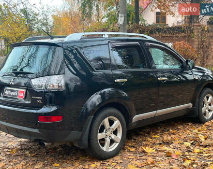 Черный Мицубиси Аутлендер ХЛ, объемом двигателя 3 л и пробегом 285 тыс. км за 9590 $, фото 11 на Automoto.ua