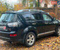 Черный Мицубиси Аутлендер ХЛ, объемом двигателя 3 л и пробегом 285 тыс. км за 9590 $, фото 11 на Automoto.ua