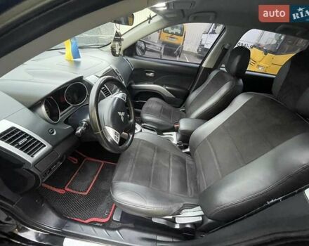 Черный Мицубиси Аутлендер ХЛ, объемом двигателя 2.4 л и пробегом 198 тыс. км за 9200 $, фото 9 на Automoto.ua