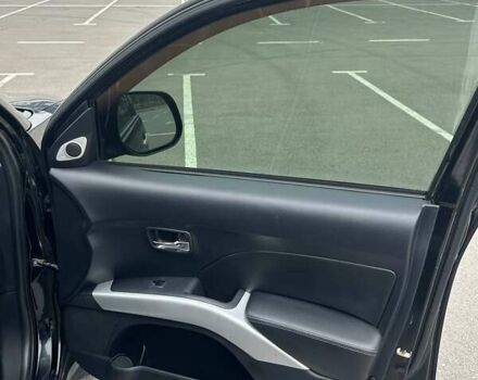 Черный Мицубиси Аутлендер ХЛ, объемом двигателя 2.36 л и пробегом 250 тыс. км за 10000 $, фото 24 на Automoto.ua