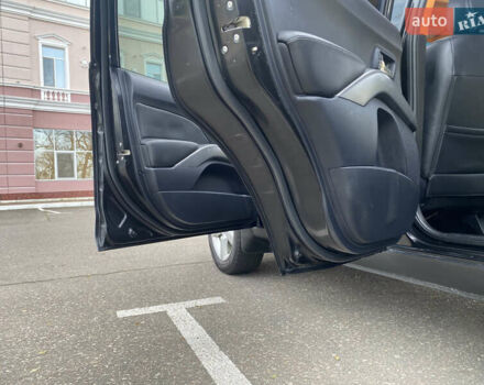 Черный Мицубиси Аутлендер ХЛ, объемом двигателя 3 л и пробегом 154 тыс. км за 8900 $, фото 22 на Automoto.ua