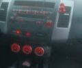 Черный Мицубиси Аутлендер ХЛ, объемом двигателя 2.36 л и пробегом 270 тыс. км за 9200 $, фото 9 на Automoto.ua