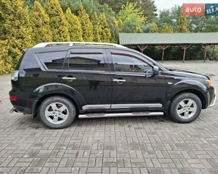 Черный Мицубиси Аутлендер ХЛ, объемом двигателя 2.4 л и пробегом 127 тыс. км за 10500 $, фото 7 на Automoto.ua