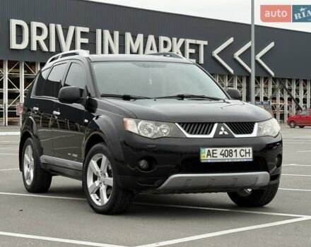Черный Мицубиси Аутлендер ХЛ, объемом двигателя 2.36 л и пробегом 175 тыс. км за 9700 $, фото 17 на Automoto.ua