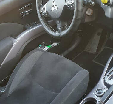 Чорний Міцубісі Аутлендер ХЛ, об'ємом двигуна 2.4 л та пробігом 325 тис. км за 7000 $, фото 9 на Automoto.ua