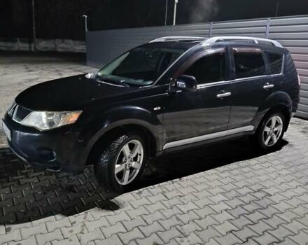 Чорний Міцубісі Аутлендер ХЛ, об'ємом двигуна 2.36 л та пробігом 390 тис. км за 7500 $, фото 1 на Automoto.ua