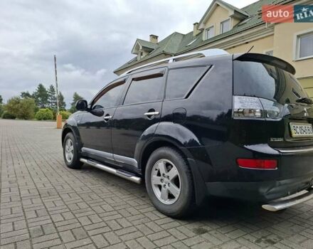 Черный Мицубиси Аутлендер ХЛ, объемом двигателя 2.4 л и пробегом 127 тыс. км за 10500 $, фото 11 на Automoto.ua