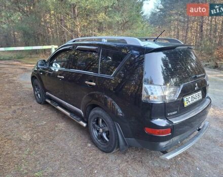 Черный Мицубиси Аутлендер ХЛ, объемом двигателя 2.4 л и пробегом 127 тыс. км за 10500 $, фото 21 на Automoto.ua
