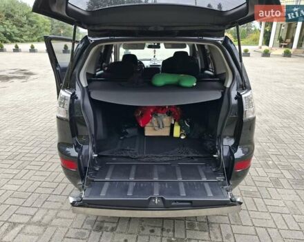 Черный Мицубиси Аутлендер ХЛ, объемом двигателя 2.4 л и пробегом 127 тыс. км за 10500 $, фото 14 на Automoto.ua