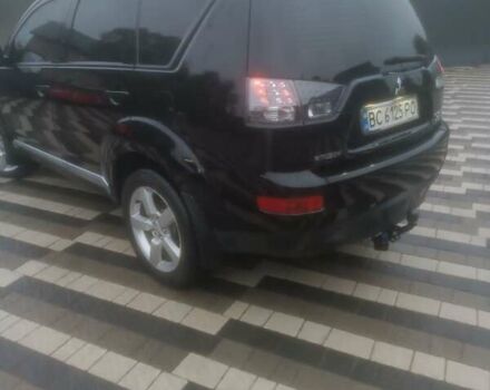 Черный Мицубиси Аутлендер ХЛ, объемом двигателя 2.36 л и пробегом 270 тыс. км за 9200 $, фото 23 на Automoto.ua