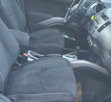 Чорний Міцубісі Аутлендер ХЛ, об'ємом двигуна 2.4 л та пробігом 325 тис. км за 7000 $, фото 8 на Automoto.ua