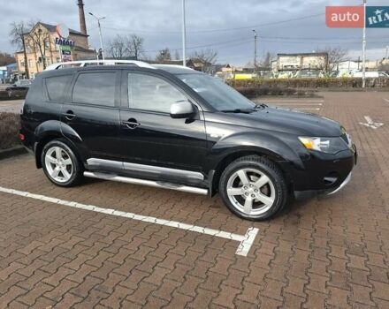 Черный Мицубиси Аутлендер ХЛ, объемом двигателя 2.36 л и пробегом 211 тыс. км за 10500 $, фото 2 на Automoto.ua