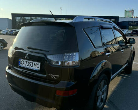 Черный Мицубиси Аутлендер ХЛ, объемом двигателя 2.36 л и пробегом 115 тыс. км за 12000 $, фото 8 на Automoto.ua