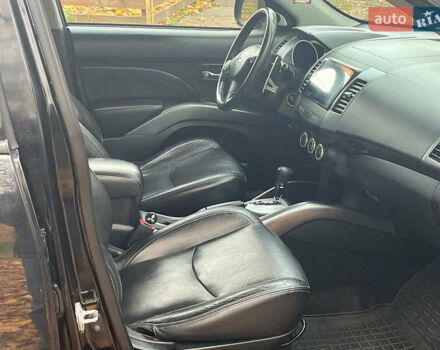 Черный Мицубиси Аутлендер ХЛ, объемом двигателя 3 л и пробегом 285 тыс. км за 9590 $, фото 13 на Automoto.ua