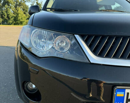 Черный Мицубиси Аутлендер ХЛ, объемом двигателя 2.36 л и пробегом 115 тыс. км за 12000 $, фото 10 на Automoto.ua