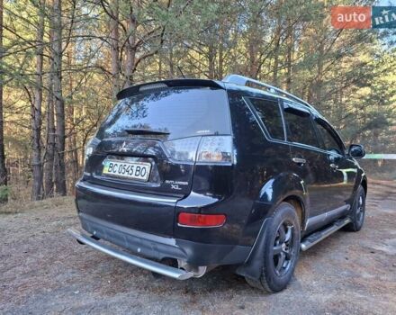 Черный Мицубиси Аутлендер ХЛ, объемом двигателя 2.4 л и пробегом 127 тыс. км за 10500 $, фото 25 на Automoto.ua