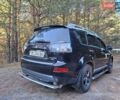 Черный Мицубиси Аутлендер ХЛ, объемом двигателя 2.4 л и пробегом 127 тыс. км за 10500 $, фото 25 на Automoto.ua