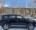 Черный Мицубиси Аутлендер ХЛ, объемом двигателя 2.36 л и пробегом 170 тыс. км за 10500 $, фото 5 на Automoto.ua