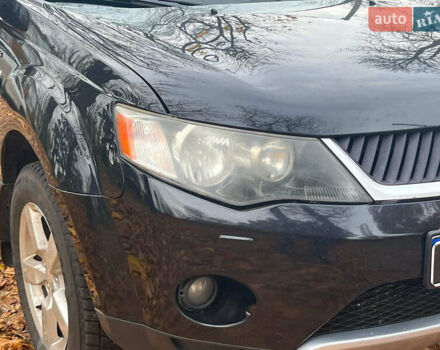 Черный Мицубиси Аутлендер ХЛ, объемом двигателя 3 л и пробегом 285 тыс. км за 9590 $, фото 2 на Automoto.ua