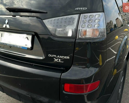 Черный Мицубиси Аутлендер ХЛ, объемом двигателя 2.4 л и пробегом 212 тыс. км за 9350 $, фото 43 на Automoto.ua