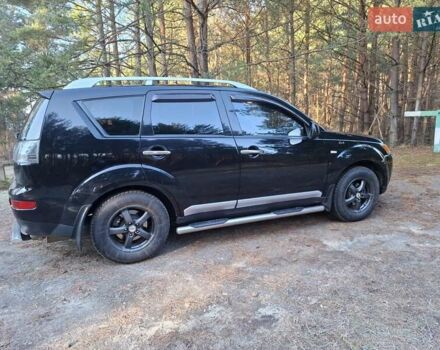 Черный Мицубиси Аутлендер ХЛ, объемом двигателя 2.4 л и пробегом 127 тыс. км за 10500 $, фото 27 на Automoto.ua