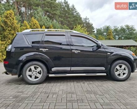 Черный Мицубиси Аутлендер ХЛ, объемом двигателя 2.4 л и пробегом 127 тыс. км за 10500 $, фото 8 на Automoto.ua