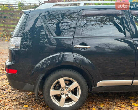 Черный Мицубиси Аутлендер ХЛ, объемом двигателя 3 л и пробегом 285 тыс. км за 9590 $, фото 12 на Automoto.ua
