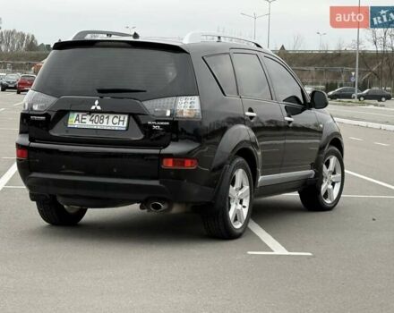 Черный Мицубиси Аутлендер ХЛ, объемом двигателя 2.36 л и пробегом 175 тыс. км за 9700 $, фото 5 на Automoto.ua