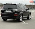Черный Мицубиси Аутлендер ХЛ, объемом двигателя 2.36 л и пробегом 175 тыс. км за 9700 $, фото 5 на Automoto.ua