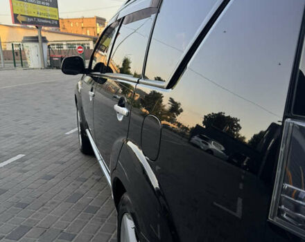 Чорний Міцубісі Аутлендер ХЛ, об'ємом двигуна 3 л та пробігом 243 тис. км за 12500 $, фото 12 на Automoto.ua