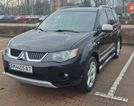 Черный Мицубиси Аутлендер ХЛ, объемом двигателя 2.36 л и пробегом 211 тыс. км за 10500 $, фото 1 на Automoto.ua