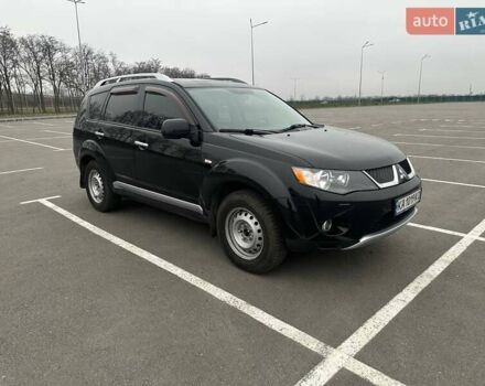 Черный Мицубиси Аутлендер ХЛ, объемом двигателя 2.36 л и пробегом 250 тыс. км за 10000 $, фото 12 на Automoto.ua