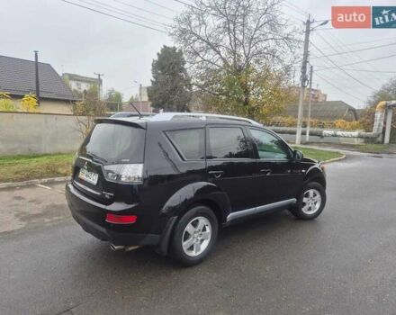 Черный Мицубиси Аутлендер ХЛ, объемом двигателя 2.36 л и пробегом 87 тыс. км за 11500 $, фото 16 на Automoto.ua