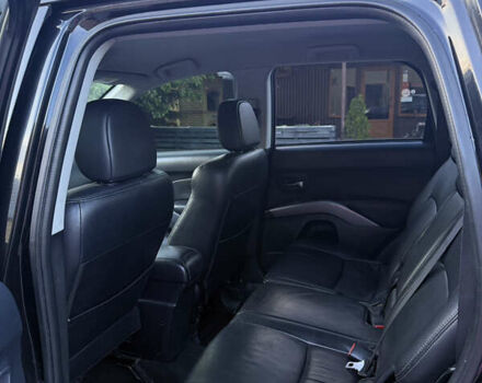 Черный Мицубиси Аутлендер ХЛ, объемом двигателя 2 л и пробегом 281 тыс. км за 9000 $, фото 9 на Automoto.ua