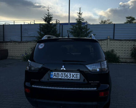 Черный Мицубиси Аутлендер ХЛ, объемом двигателя 2 л и пробегом 281 тыс. км за 9000 $, фото 4 на Automoto.ua