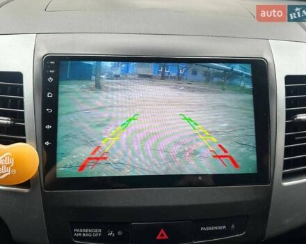 Черный Мицубиси Аутлендер ХЛ, объемом двигателя 2.36 л и пробегом 250 тыс. км за 10000 $, фото 30 на Automoto.ua